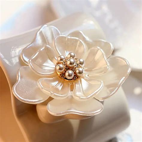 camelia brooches for women.